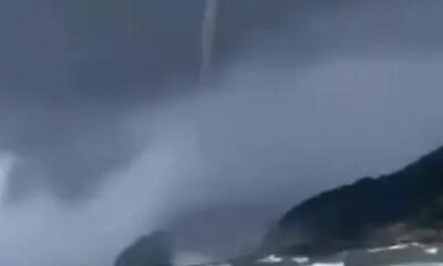 Tromba d'água em Paraty impressiona banhistas e turistas neste domingo